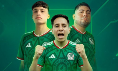 Three Mexican soccer players in green jerseys standing in a heroic pose against a teal background, with the central player shouting and fists clenched.